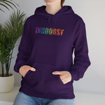 A person wearing a purple hooded sweatshirt with the text 'INDOOSY' written in a stylized font on the front.