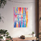 A vertical canvas wall art print featuring the quote 'When in doubt, throw the whole can out.' in white script over a colorful watercolor-style striped background.