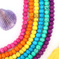 Bead Bundle: 7mm Rondelle Handmade Bone Beads, Carved Target, Bright Rainbow, 6 Strands