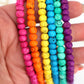 Bead Bundle: 7mm Rondelle Handmade Bone Beads, Carved Target, Bright Rainbow, 6 Strands
