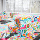 Bespattered Facade Rainbow Doodles Wrapping Paper | Three Sizes | Glossy or Matte