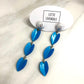 Silver & Capri Moonglow Lucite Statement Earrings
