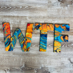 Bespattered Facade Intergalactic Rainbow WTF Letters