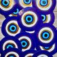 Bespattered Facade Metallic Gold and Blue Evil Eye Sticker