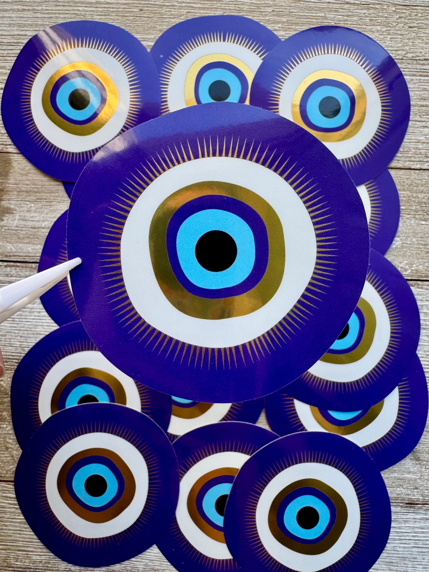 Bespattered Facade Metallic Gold and Blue Evil Eye Sticker