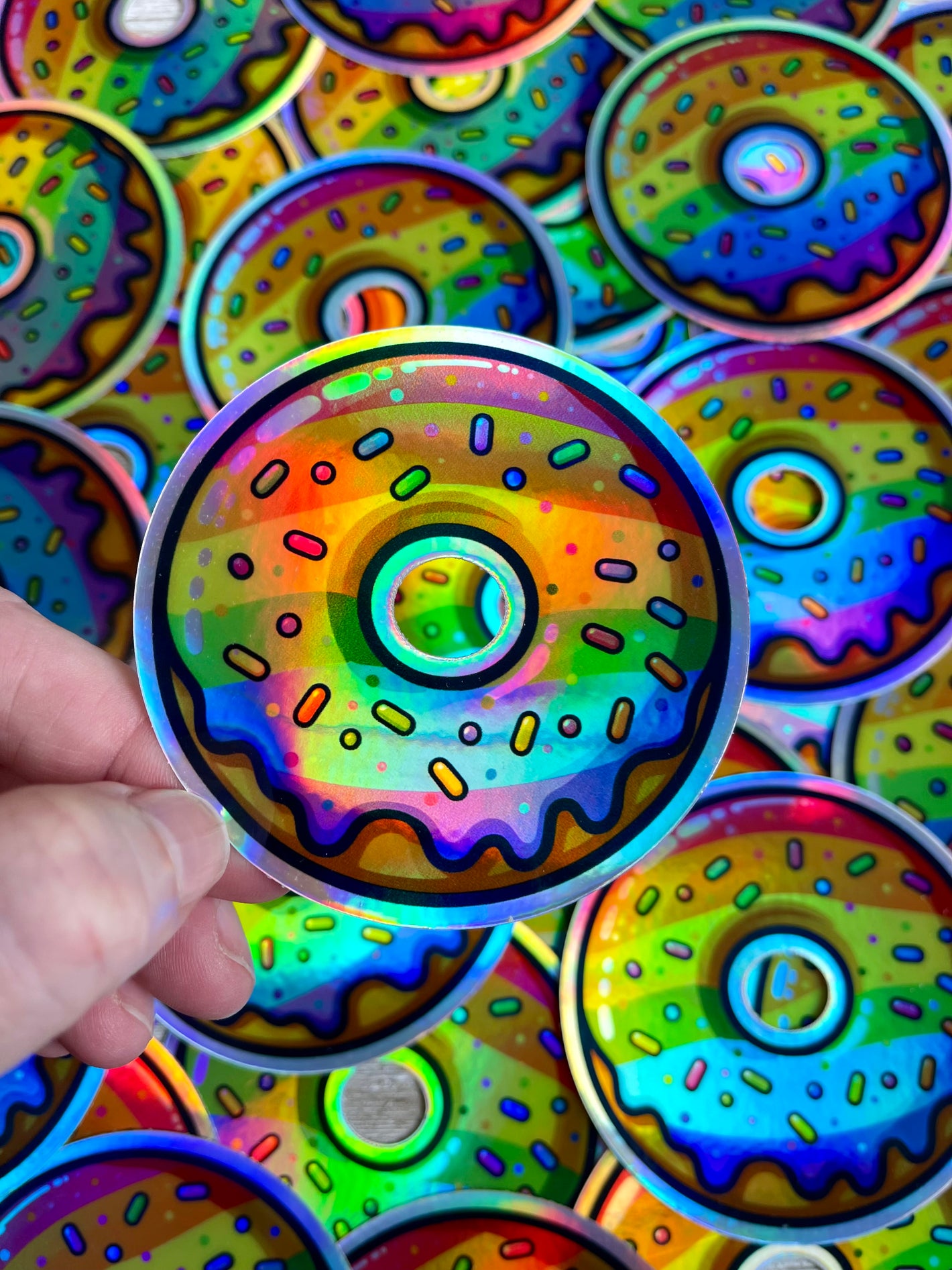 Bespattered Facade Holographic Rainbow Sprinkle Donut Sticker