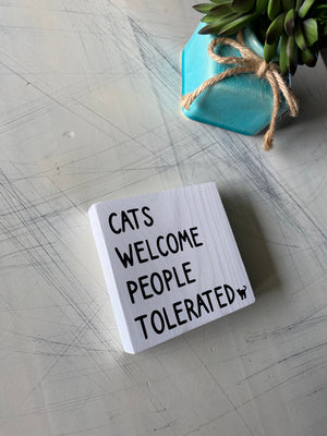 Cats welcome people tolerated