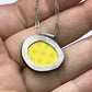 Abstract Oval with Yellow Dots