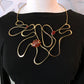 Niemeyer Curves Necklace in Brass and Carnelian