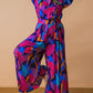 DARE TO TAKE THE WOVEN JUMPSUIT